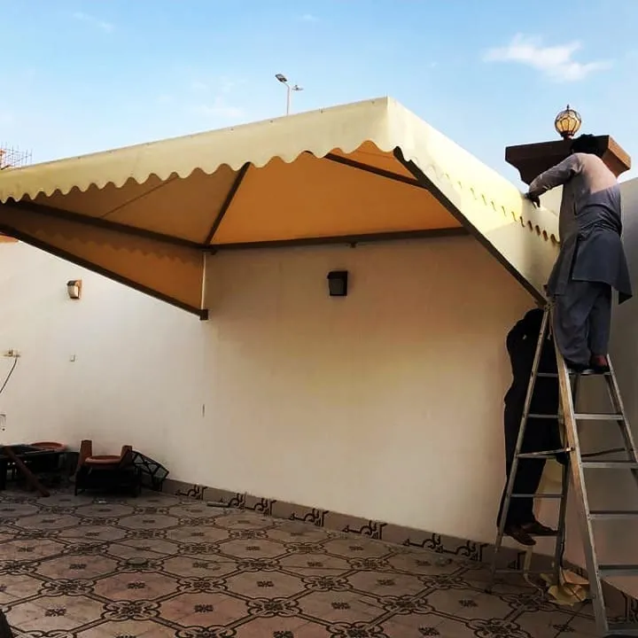 اصلاح مظلات كراج مقوسة بتثبيت آمن في حي النرجس والياسمين بشمال الرياض 